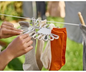 Beżowa wisząca suszarka na pranie Petal – Joseph Joseph