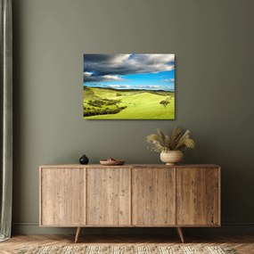 Obraz na szkle - Zielony krajobraz ze wzgórzami (70x50 cm)