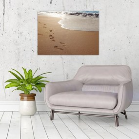 Obraz na szkle - ślady stóp na piasku i morzu (70x50 cm)