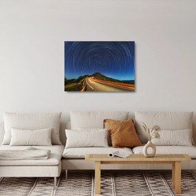 Obraz na szkle obracających się gwiazd (70x50 cm)