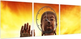 Obraz - Budda z czerwonym i żółtym tłem (z zegarem) (90x30 cm)