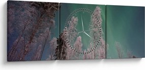 Obraz zorzy polarnej nad zamarzniętymi drzewami (z zegarem) (90x30 cm)