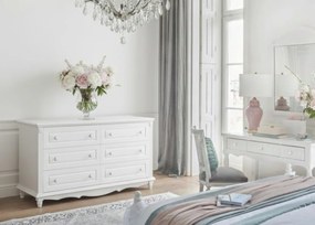 Biała komoda z szufladami Nelia. 6 pojemnych szuflad w dwóch rzędach, białe gałki, frezowania. Komoda do salonu, komoda do sypialni.