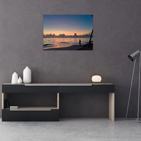 Obraz na szkle - kobieta na plaży (70x50 cm)