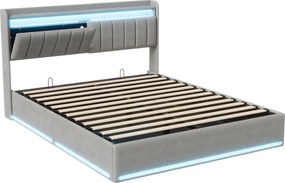 Łóżko z pojemnikiem na pościel o wymiarach 140x190 cm, wykończone szarym welurem, z oświetleniem LED RGB, zagłówkiem ze schowkiem oraz portami USB i USB-C