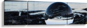 Obraz szklanej kuli na skale (170x50 cm)