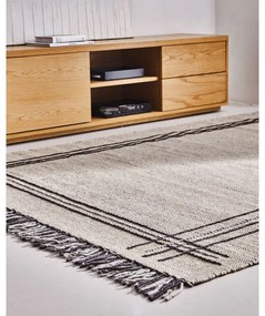 Szafka pod TV w dekorze dębu w naturalnym kolorze 200x44 cm Abilen − Kave Home