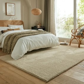 Beżowy dywan z włókien z recyklingu odpowiedni do prania 120x170 cm Fluffy – Flair Rugs