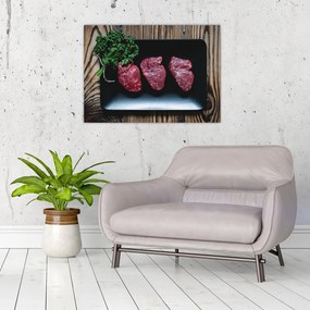 Obraz na szkle mięsa na talerzu (70x50 cm)