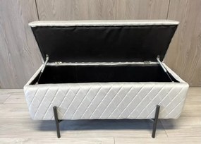 Elegancka tapicerowana pufa Tanis z pojemnikiem w stylu glamour na nogach