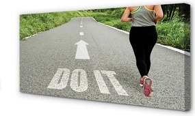 Obraz canvas na ścianę Kobieta Biegnąca Drogą