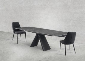 Elegancki stół z szarym ceramicznym blatem na hartowanym szkle. Metalowa podstawa z czarnej stali nadaje mu nowoczesny charakter i wyjątkową trwałość.