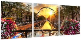 Obraz - Wschód słońca w Amsterdamie (z zegarem) (90x30 cm)