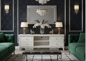 Elegancka szafka pod telewizor Odile, wymiary 180x47x58 cm, kolor ecru. Szafka rtv ma ozdobne fronty, cokół z motywem róży. Meble w stylu francuskim.