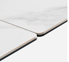 Nowoczesny stół rozkładany Nexus o wymiarach 200(280)×90 cm zachwyca eleganckim blatem z masy ceramicznej i solidną podstawą ze stali szczotkowanej. Styl, trwałość i funkcjonalność w jednym – idealny do jadalni i salonu.