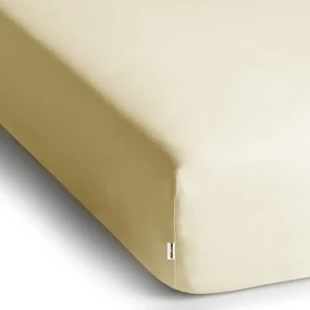 Kremowe dżersejowe prześcieradło z gumką 140x200 cm Amber – Restilo