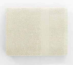 Kremowy bawełniany ręcznik frotte 30x50 cm Marina – DecoKing