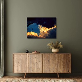 Obraz na szkle skoczka spadochronowego w chmurach (70x50 cm)