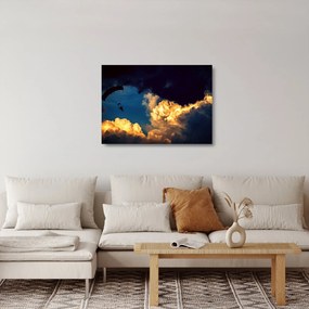 Obraz na szkle skoczka spadochronowego w chmurach (70x50 cm)