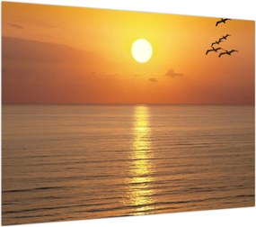 Obraz na szkle - Zachód słońca nad oceanem (70x50 cm)