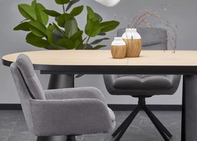 Nowoczesny rozkładany stół owalny Heksagon 180-230/100 cm z blatem MDF w kolorze dębu na czarnych metalowych nogach