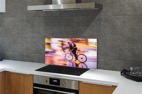 Szklany Panel Człowiek i Rower w Blasku Świateł