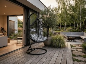 Czarne wiszące krzesło KOKON ze stojakiem, zielono-biała poduszka