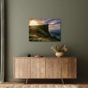 Obraz na szkle kobiet na klifie (70x50 cm)