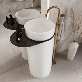 Umywalka z konglomeratu wolnostojąca okrągła z półką szklaną 85 x 40 cm RONA bez przelewu | Różne kolory półki : Kolor szkła - Czarny, Kolor umywalki RONA - Biały połysk, Podłączenie syfonu - Do podłogi, Półka - Szklana