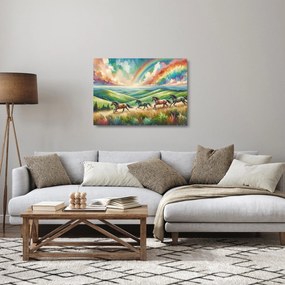 Obraz na szkle – Konie galopujące przez krajobraz (70x50 cm)