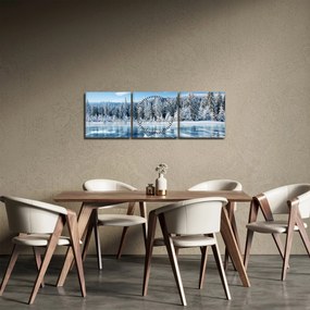 Obraz zamarzniętego jeziora i pokrytych śniegiem drzew (z zegarem) (90x30 cm)