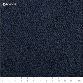 Ciemnoniebieska rozkładana sofa ze schowkiem z materiału bouclé 222 cm Bali – Cosmopolitan Design