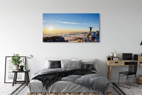 Obraz canvas na ścianę Człowiek w Górach o Wschodzie