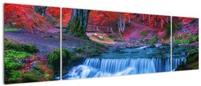 Obraz wodospadu w czerwonym lesie (170x50 cm)