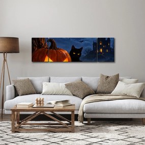 Obraz - Czarny kot przy świecącej dyni na Halloween (170x50 cm)