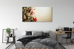 Obraz na płótnie Świąteczny Stół: Gałązki, Prezenty, Szyszki i Pierniki