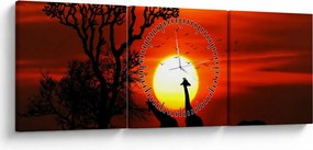 Obraz - Sylwetki zwierząt o zachodzie słońca (z zegarem) (90x30 cm)