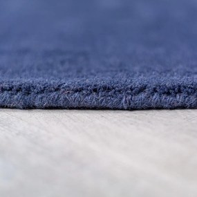 Niebieski wełniany okrągły dywan tkany ręcznie ø 150 cm Mia Segment – Flair Rugs