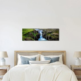 Obraz wodospadu między skałami (z zegarem) (90x30 cm)