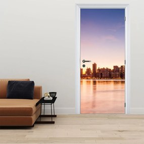 Fototapeta na drzwi - Miasto o zachodzie słońca (95x205cm)
