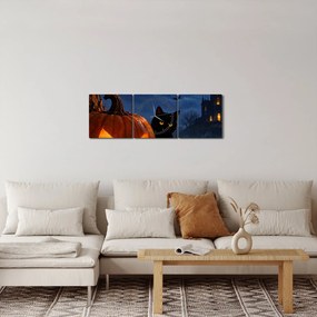 Obraz - Czarny kot przy świecącej dyni na Halloween (z zegarem) (90x30 cm)