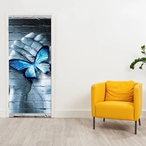 Fototapeta na drzwi - Niebieski motyl na ścianie (95x205cm)
