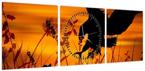 Obraz sylwetki drapieżnika (z zegarem) (90x30 cm)