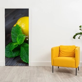 Fototapeta na drzwi - Cytryna i mięta na stole (95x205cm)