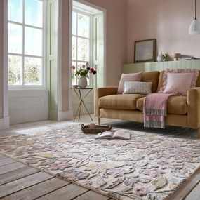 Kremowy wełniany dywan tkany ręcznie 120x170 cm Tania Floral – Flair Rugs