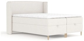 Kremowe łóżko boxspring ze schowkiem 180x200 cm Monpelli – Maison de Rêve