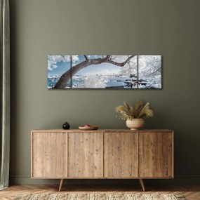 Obraz ośnieżonego drzewa nad wodą (170x50 cm)