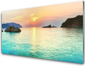 Panel Szklany Słoneczny Blask na Skalistym Brzegu