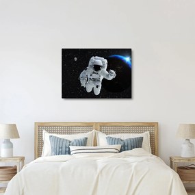 Obraz - Astronauta w kosmosie (70x50 cm)