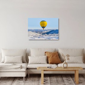 Obraz na szkle - Lot nad zimowym krajobrazem (70x50 cm)